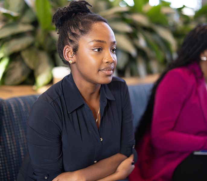 Spectrum Scholar chats with her mentor during the 2023 Scholars Summit