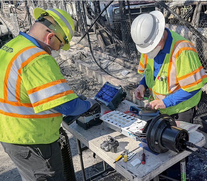 Spectrum technicians work to restore service following the Southern California wildfires